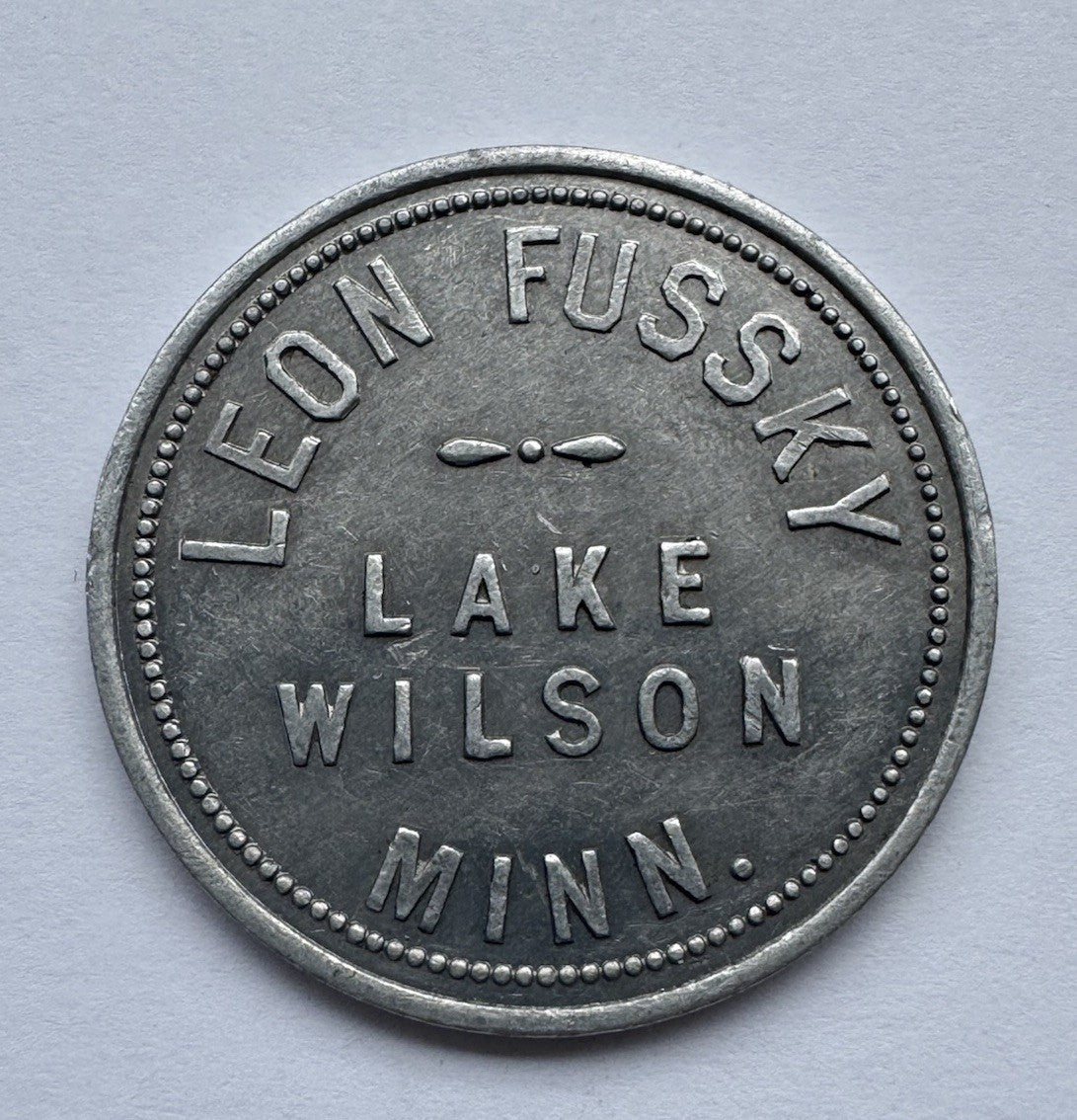 Leon Fussky Lake Wilson MN $1 Aluminum Trade Token – Rare Vintage Store Token