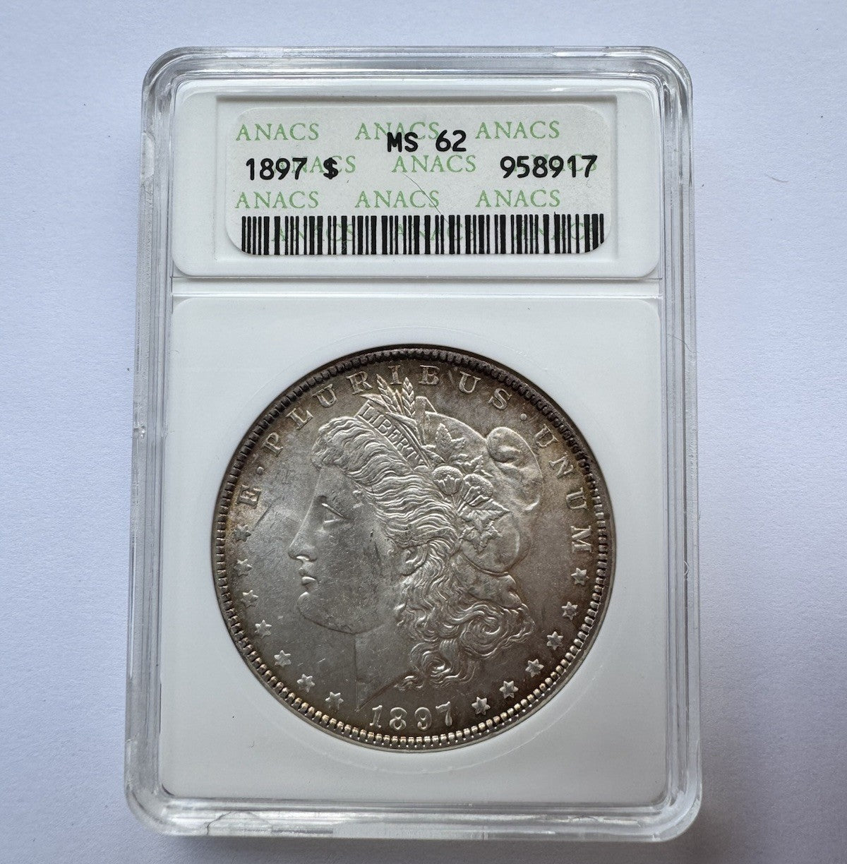 1897 Morgan Silver Dollar – ANACS MS62 – Soapbox Holder - Natural Toning