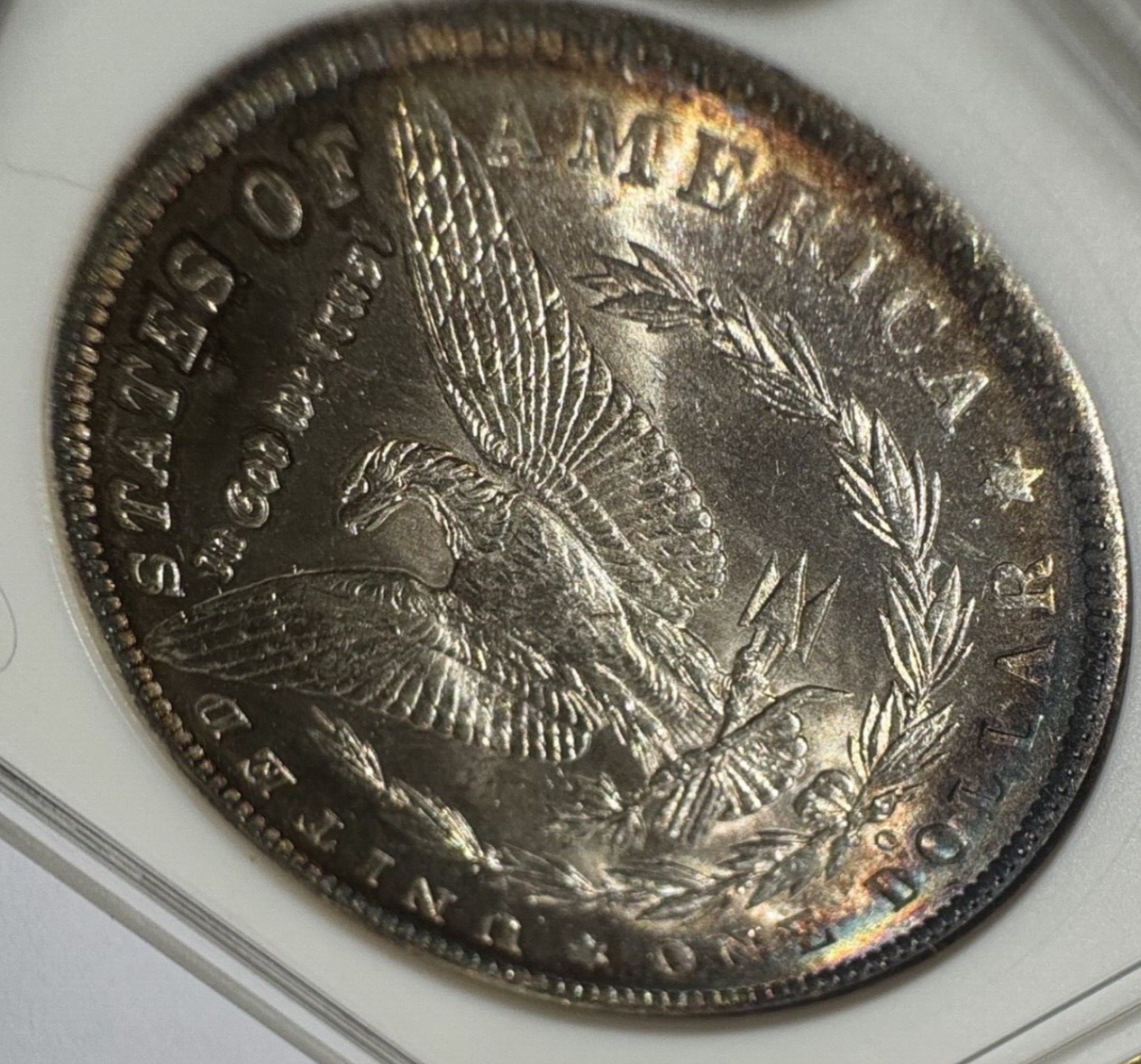 1885-O Morgan Silver Dollar – ANACS Certified MS62 – *End Of Roll Toner*