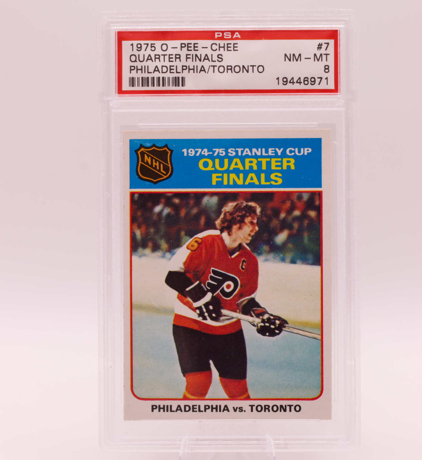 1975 O-Pee-Chee #7 Stanley Cup Quarter Finals Philadelphia vs Toronto PSA 8