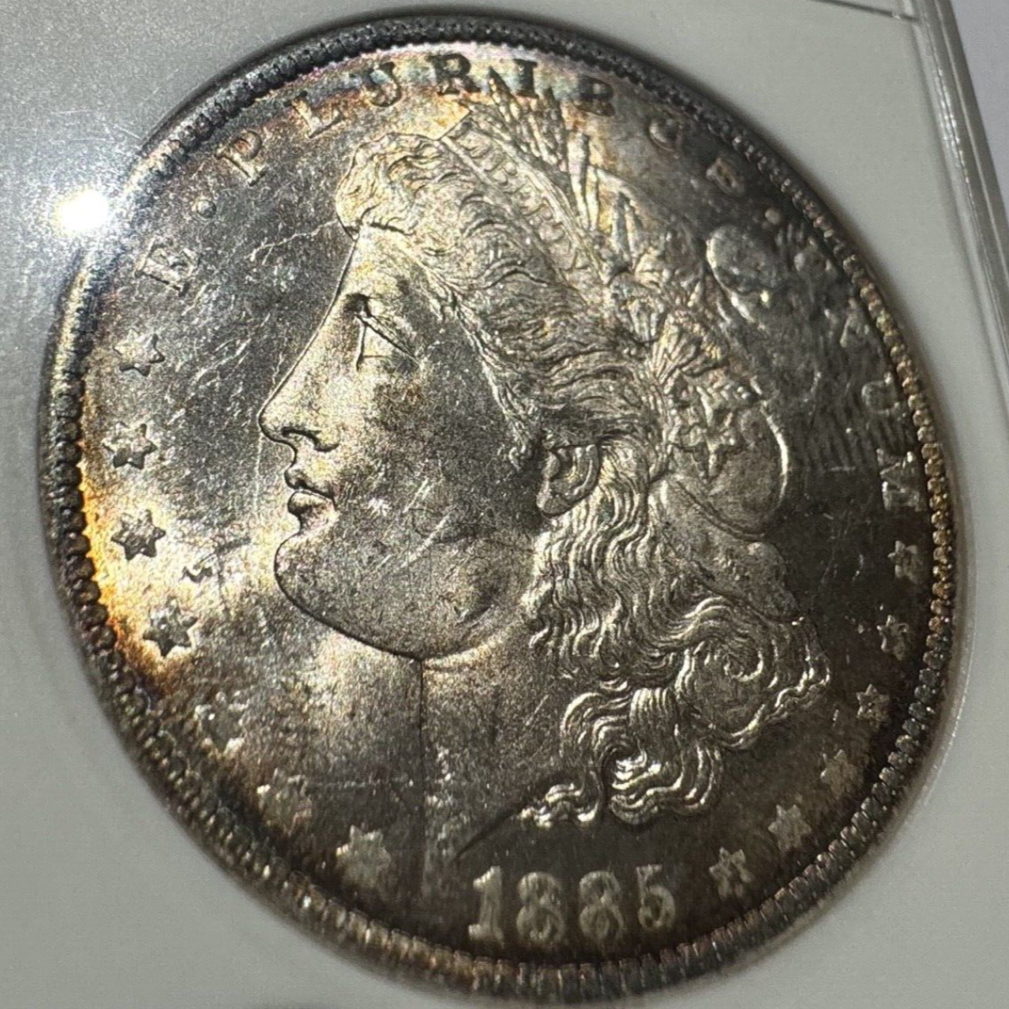 1885-O Morgan Silver Dollar – ANACS Certified MS62 – *End Of Roll Toner*