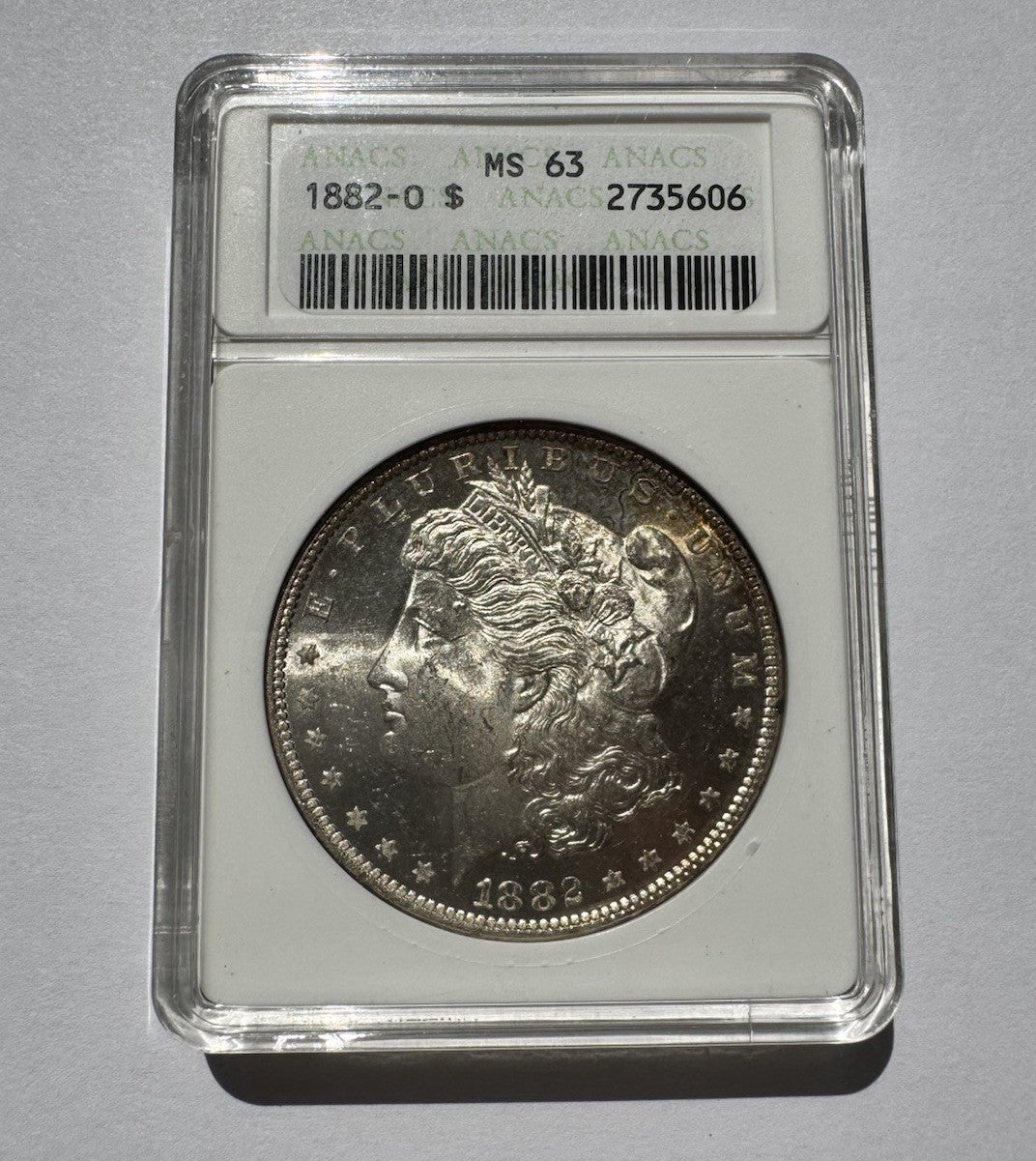 1882-O Morgan Silver Dollar – ANACS MS63 – Old Soapbox Holder, 90% Silver