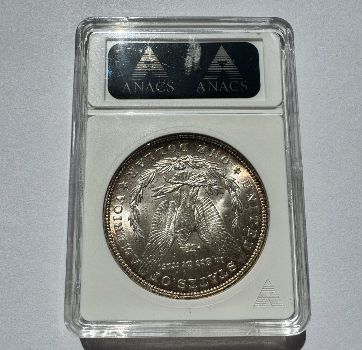 1885-O Morgan Silver Dollar – ANACS MS63 – Old Soapbox Holder, Scarce “O”
