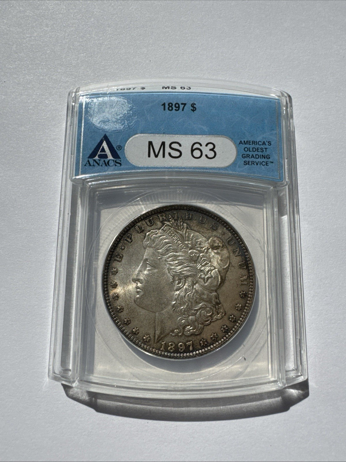1897 Morgan Silver Dollar ANACS MS63, Beautifully Toned 90% Silver Coin