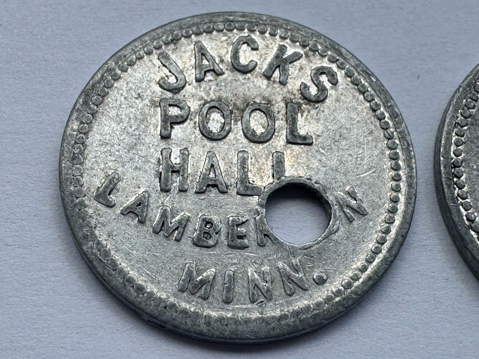 2x Jack’s Pool Hall Lamberton MN 5¢ Trade Token Aluminum Holed Bar Coin Vintage