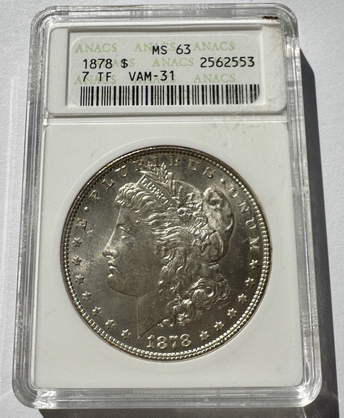 1878 7TF Morgan Silver Dollar VAM‑31 MS63 ANACS Soapbox Certified Scarce