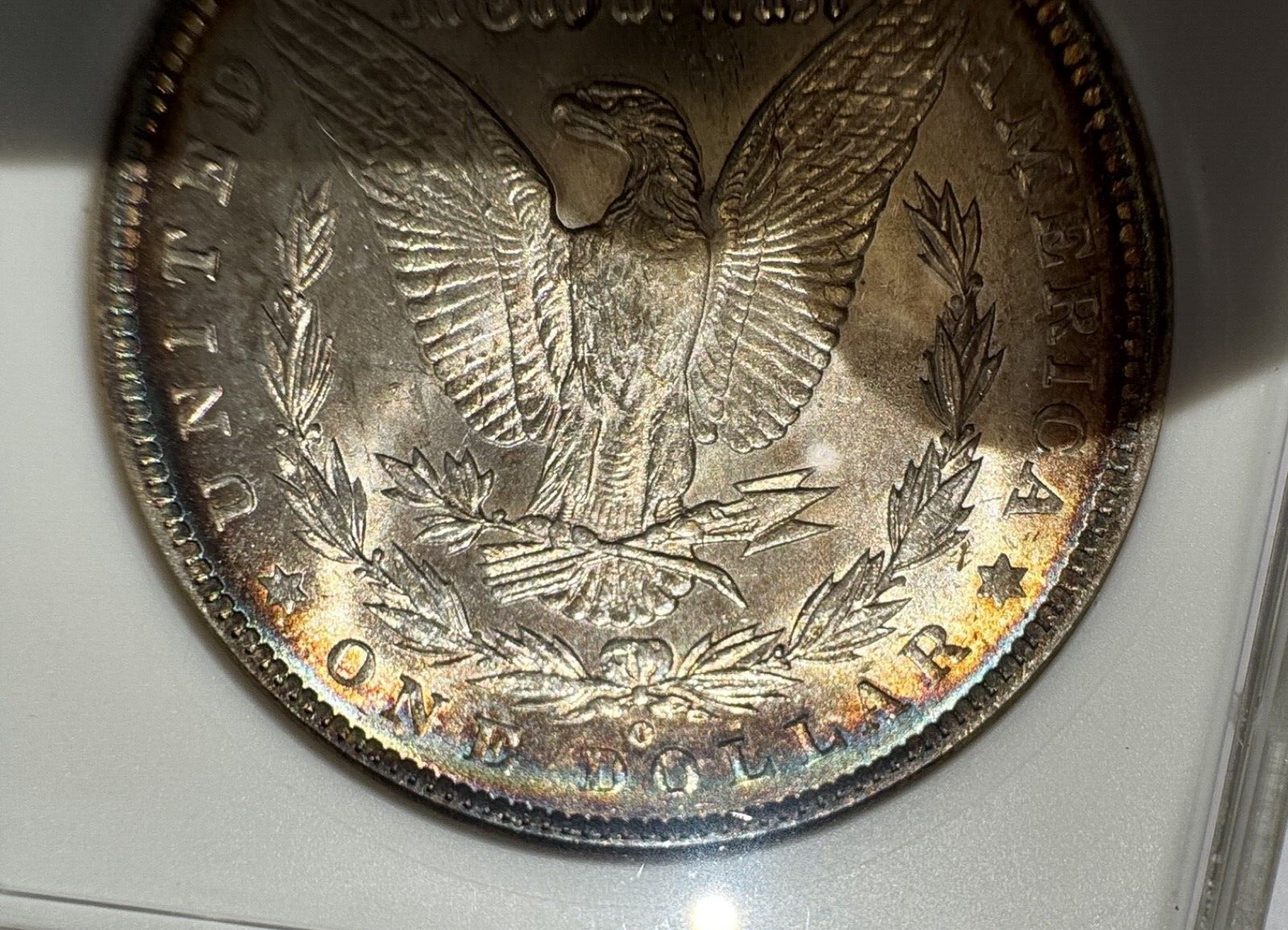 1885-O Morgan Silver Dollar – ANACS Certified MS62 – *End Of Roll Toner*