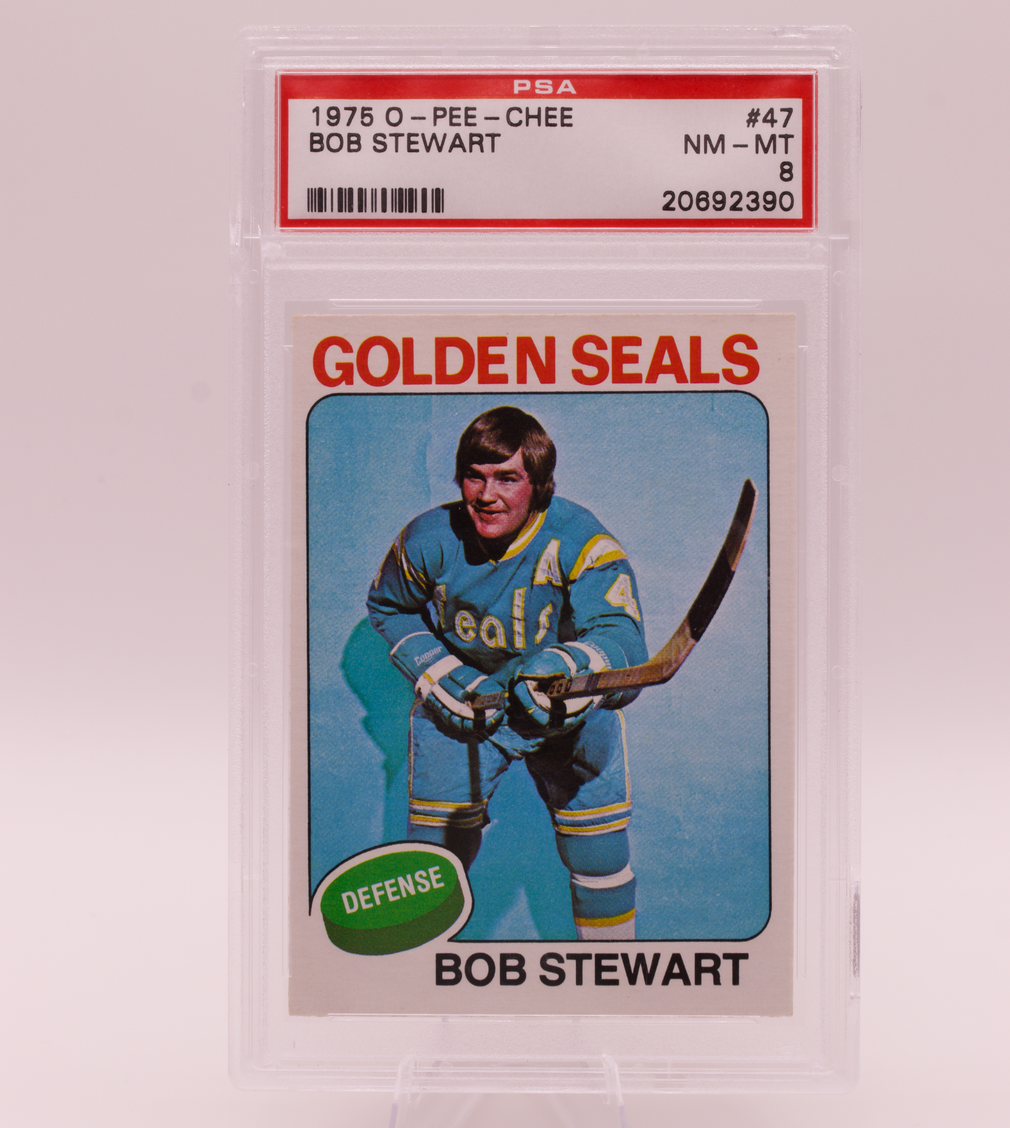 1975 O-Pee-Chee #47 Bob Stewart PSA 8 NM-MT California Golden Seals Defense