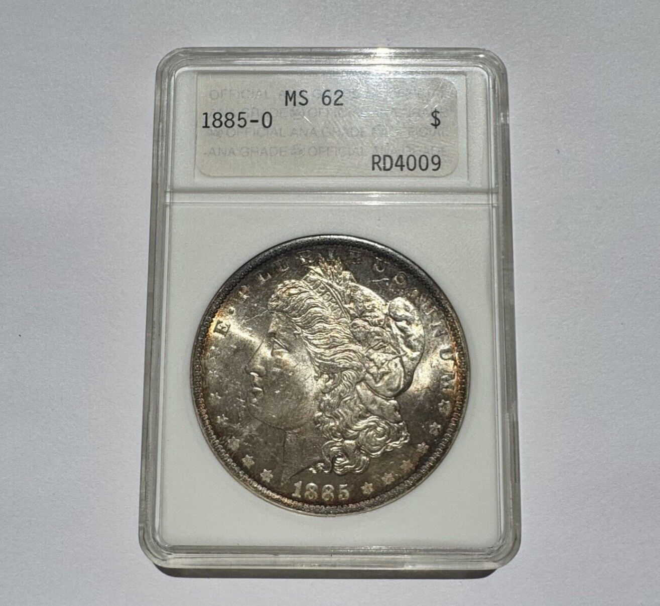 1885-O Morgan Silver Dollar – ANACS Certified MS62 – *End Of Roll Toner*
