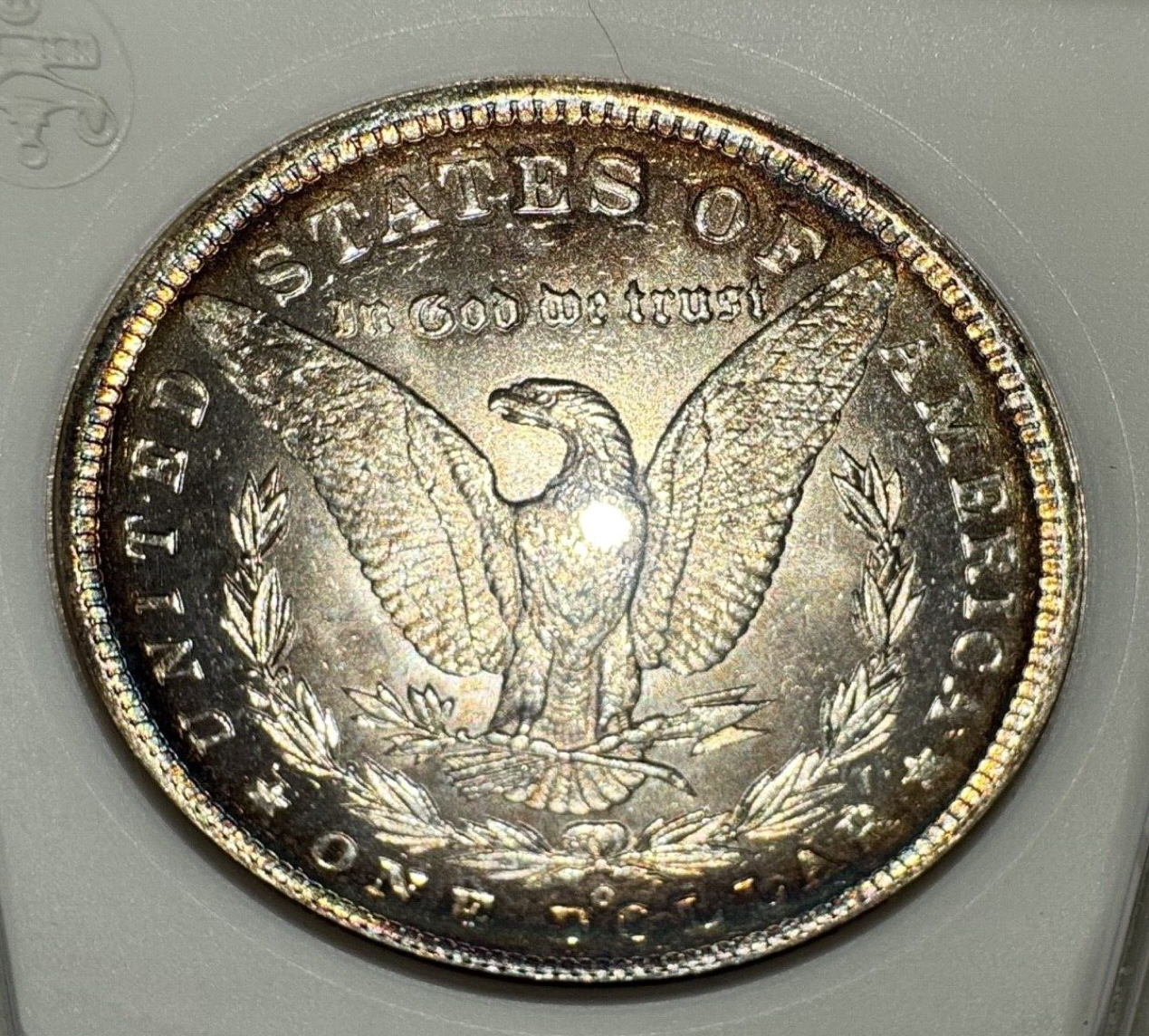 1885-O Morgan Silver Dollar – ANACS Certified MS62 – *End Of Roll Toner*