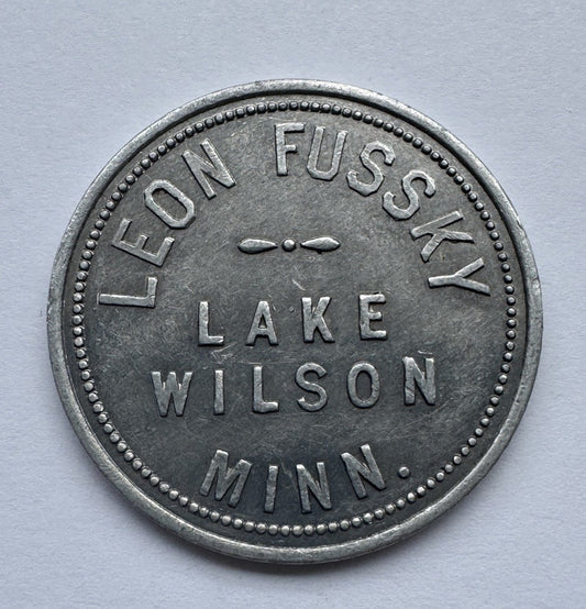 Leon Fussky Lake Wilson MN $1 Aluminum Trade Token – Rare Vintage Store Token
