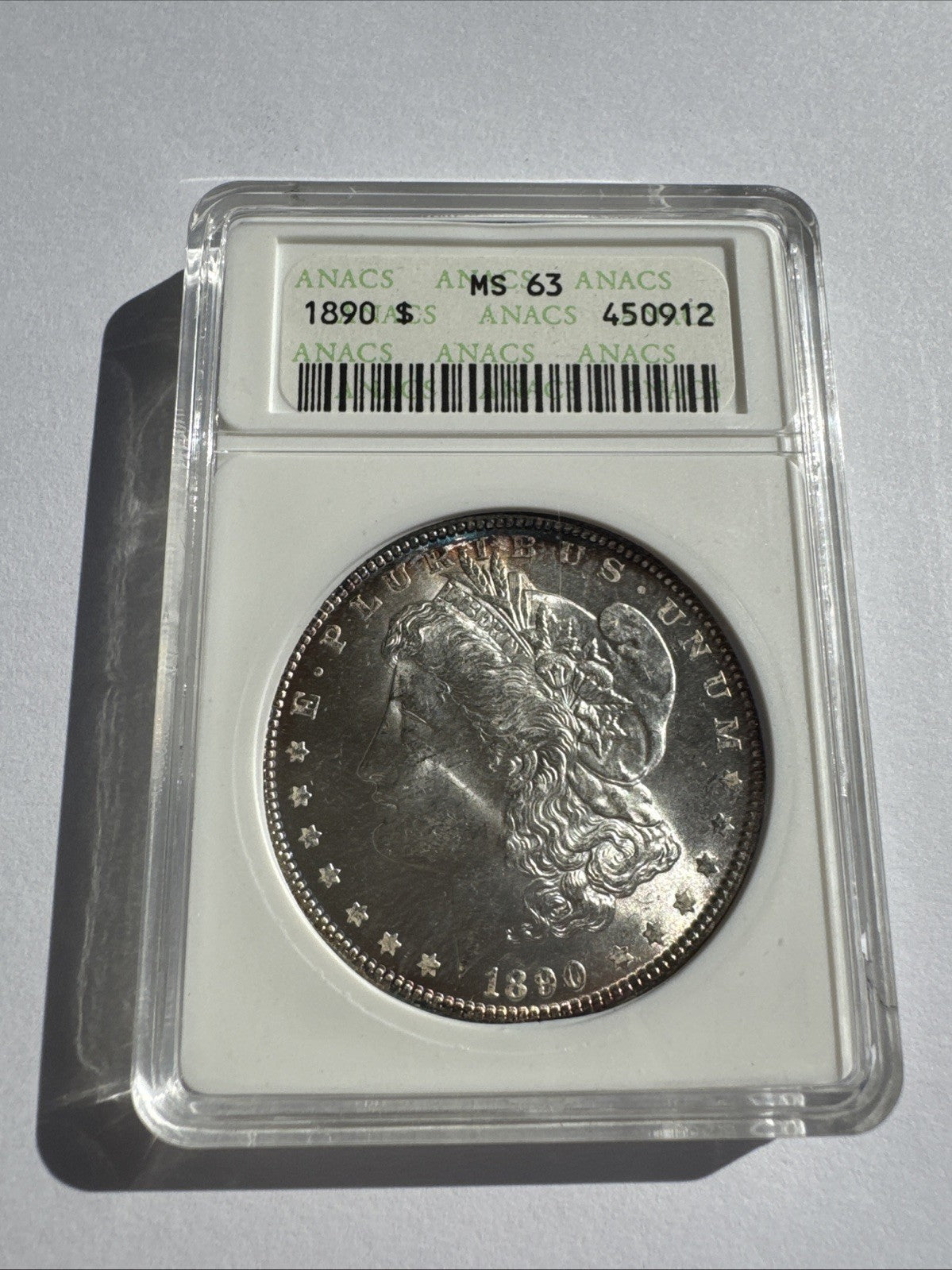 1890 Morgan Silver Dollar – ANACS Certified MS63 – Uncirculated *Toner*