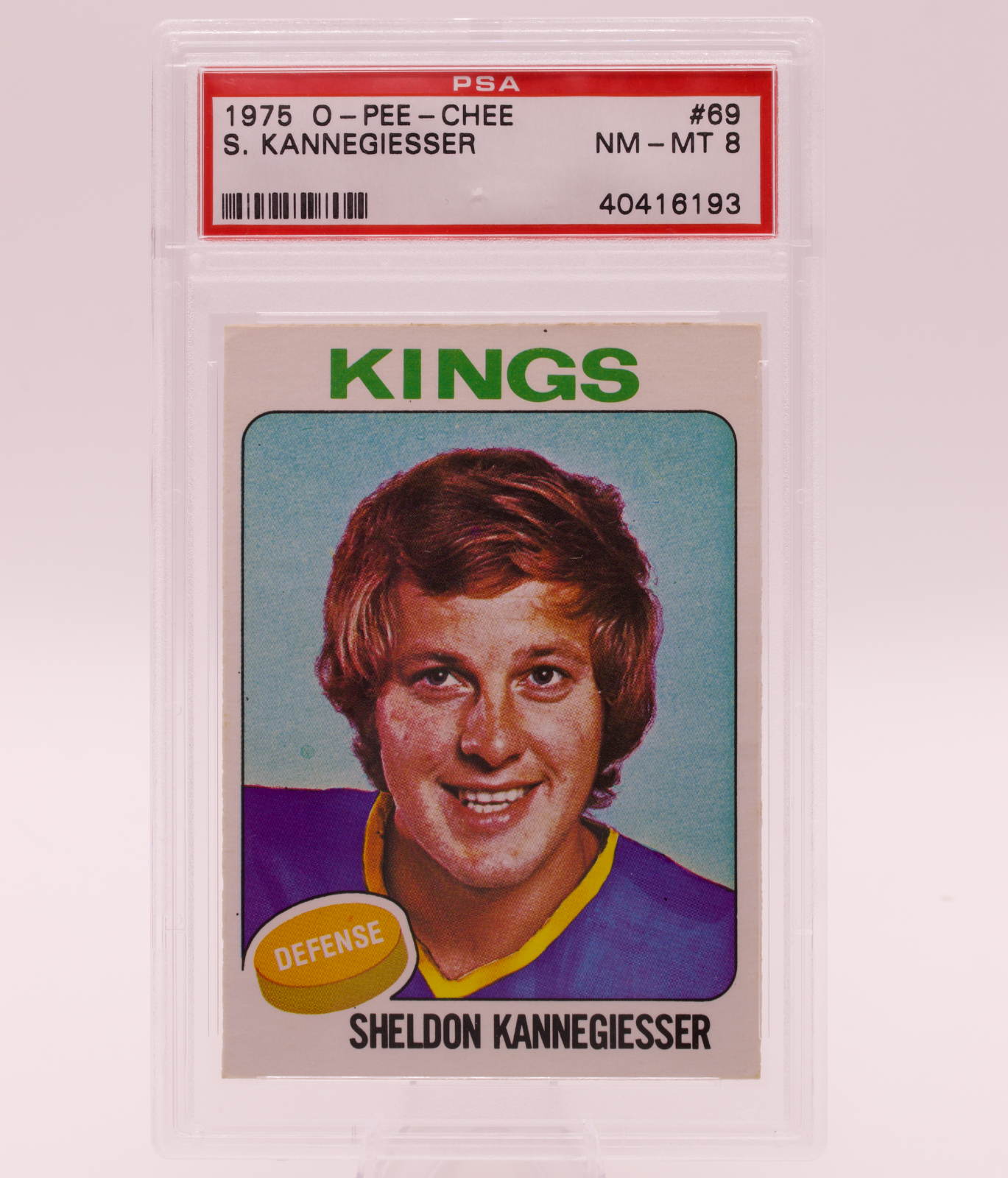 1975 O-Pee-Chee #69 Sheldon Kannegiesser PSA 8 NM-MT Los Angeles Kings Defense