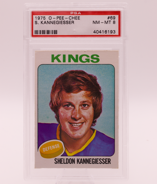 1975 O-Pee-Chee #69 Sheldon Kannegiesser PSA 8 NM-MT Los Angeles Kings Defense