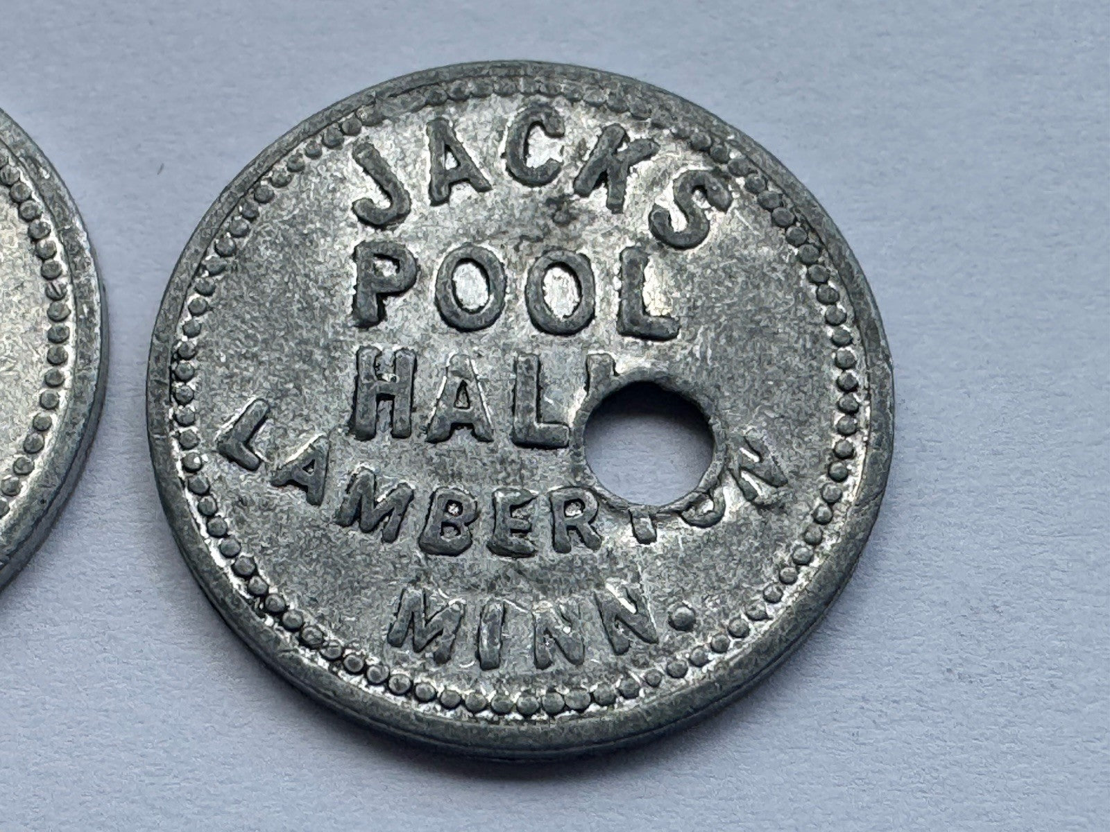 2x Jack’s Pool Hall Lamberton MN 5¢ Trade Token Aluminum Holed Bar Coin Vintage