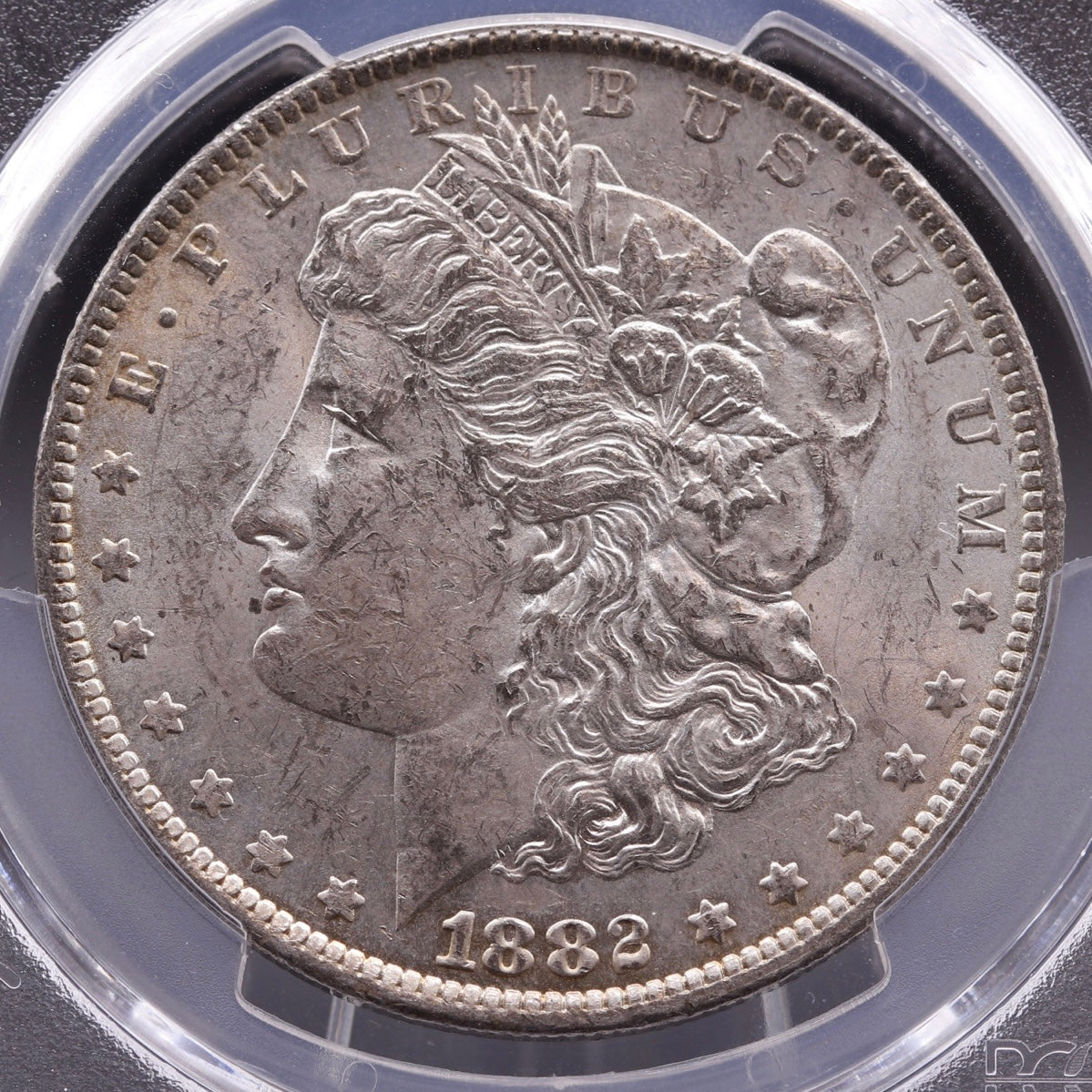 1882-O/S Morgan Silver Dollar PCGS AU58 • Weak Strike Coin
