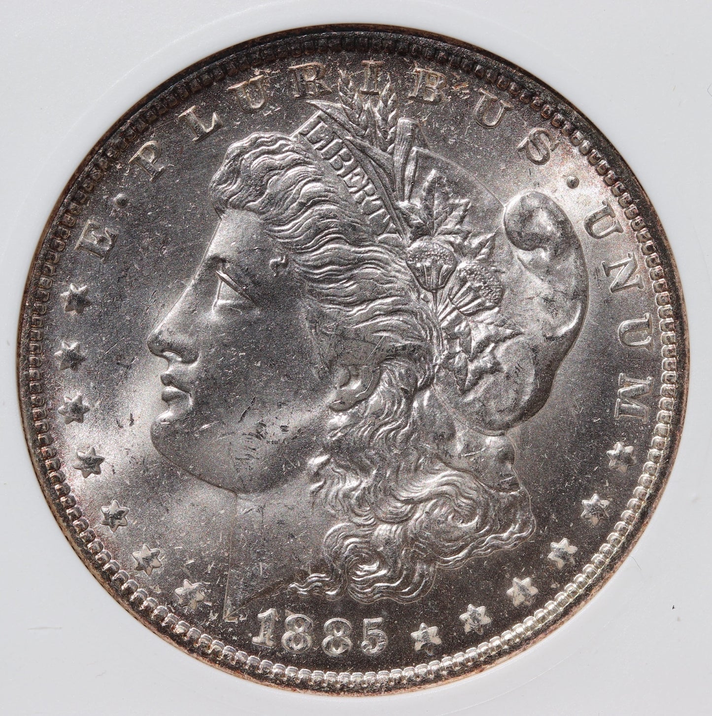 1885-O Morgan Silver Dollar – ANACS MS63 – Old Soapbox Holder, Scarce “O”