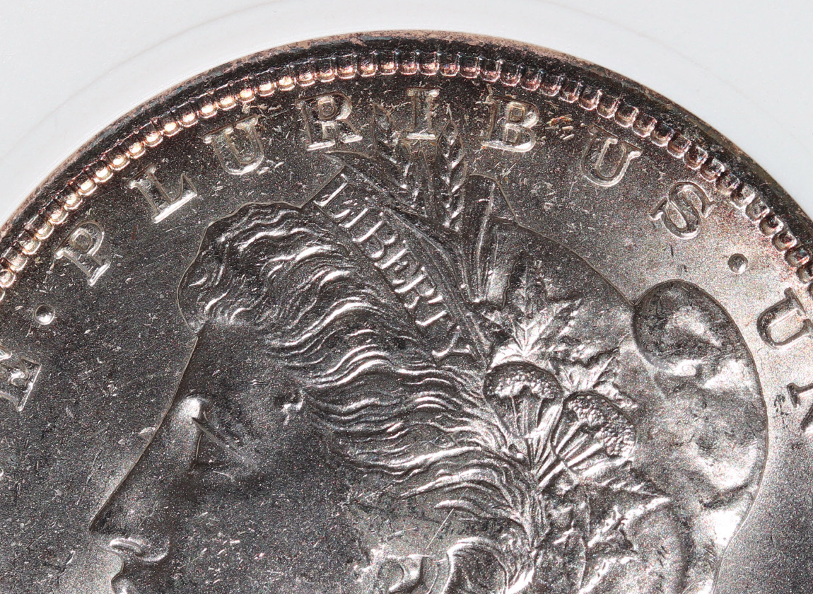 1885-O Morgan Silver Dollar – ANACS MS63 – Old Soapbox Holder, Scarce “O”